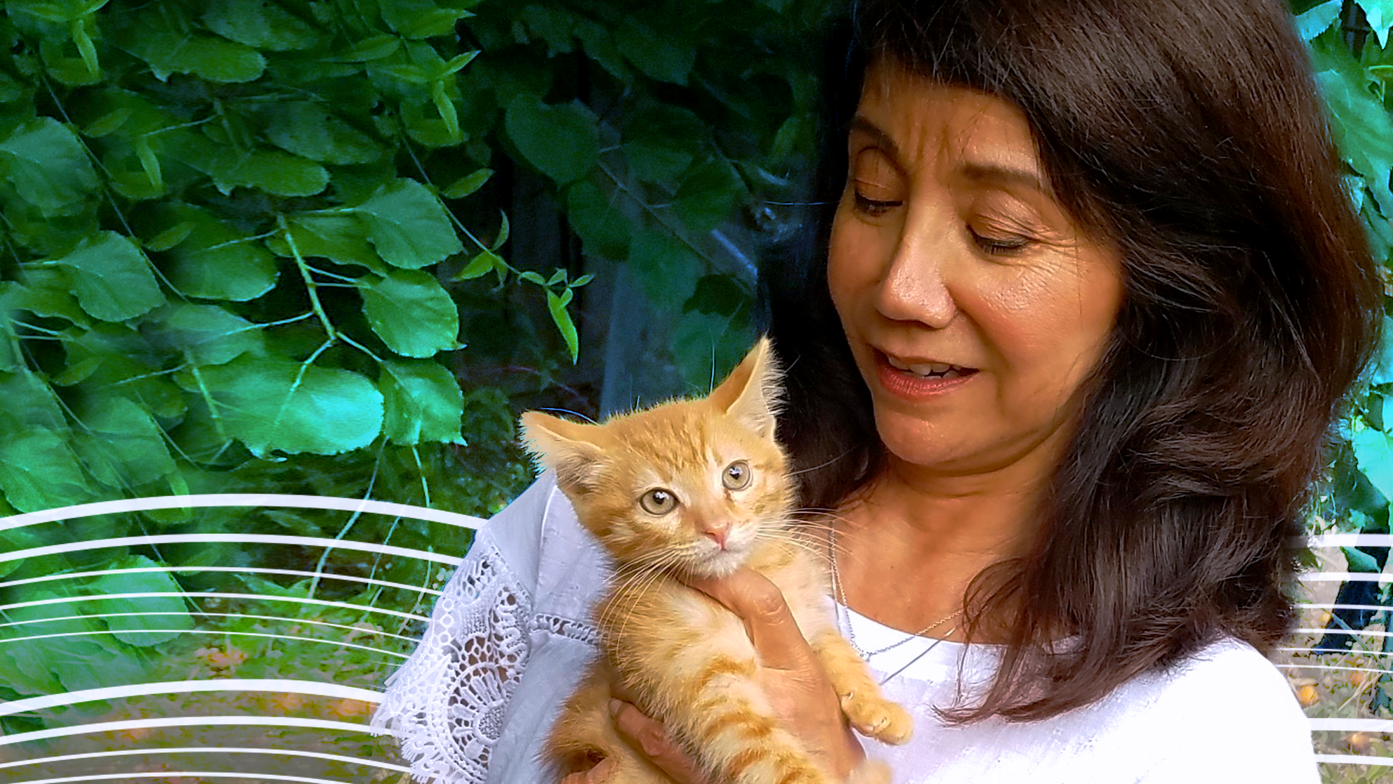Madeline with orange tabby kitten
